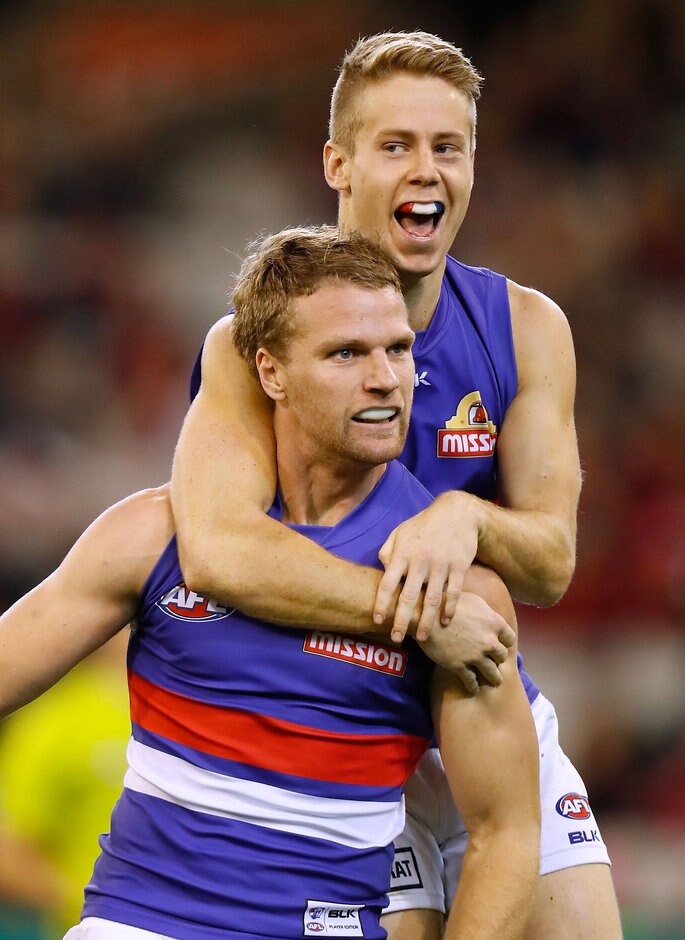 AFL 2016 Rd 08 - Melbourne v Western Bulldogs Jake Stringer and Lachie Hunter savour the win - ${keywords}